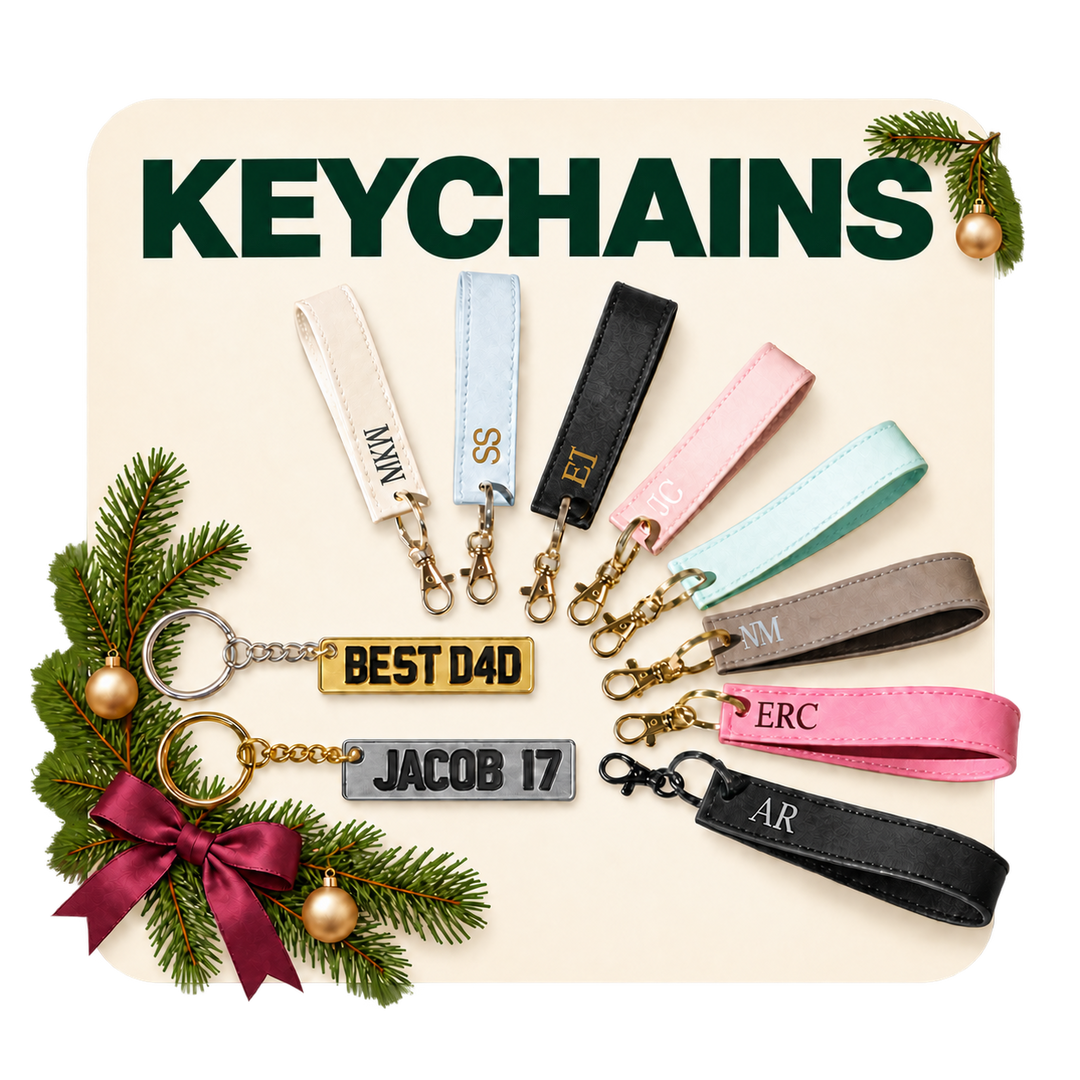 Personalised keychains collection featuring custom engraved keyrings, leather wristlet keychains and novelty personalised gifts on a purple background.