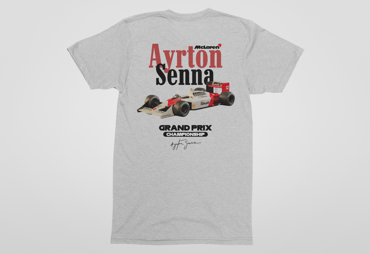 Gray t-shirt with Ayrton Senna McLaren Grand Prix graphic on a white background
