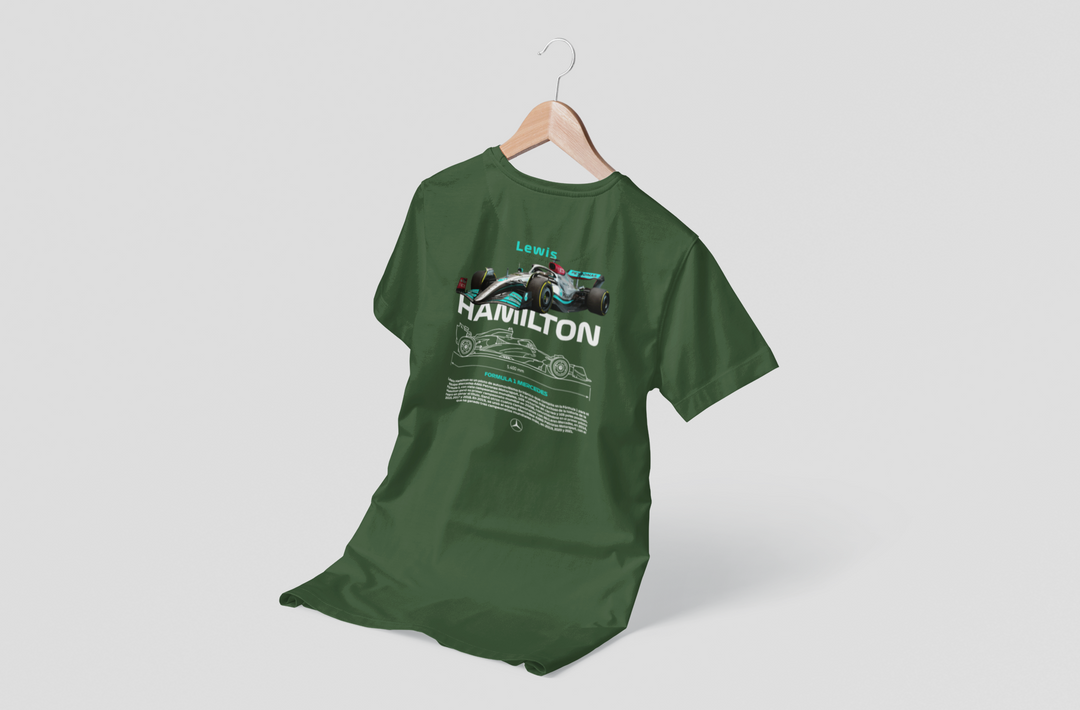 Green t-shirt with Formula 1 design on a hanger against a white background