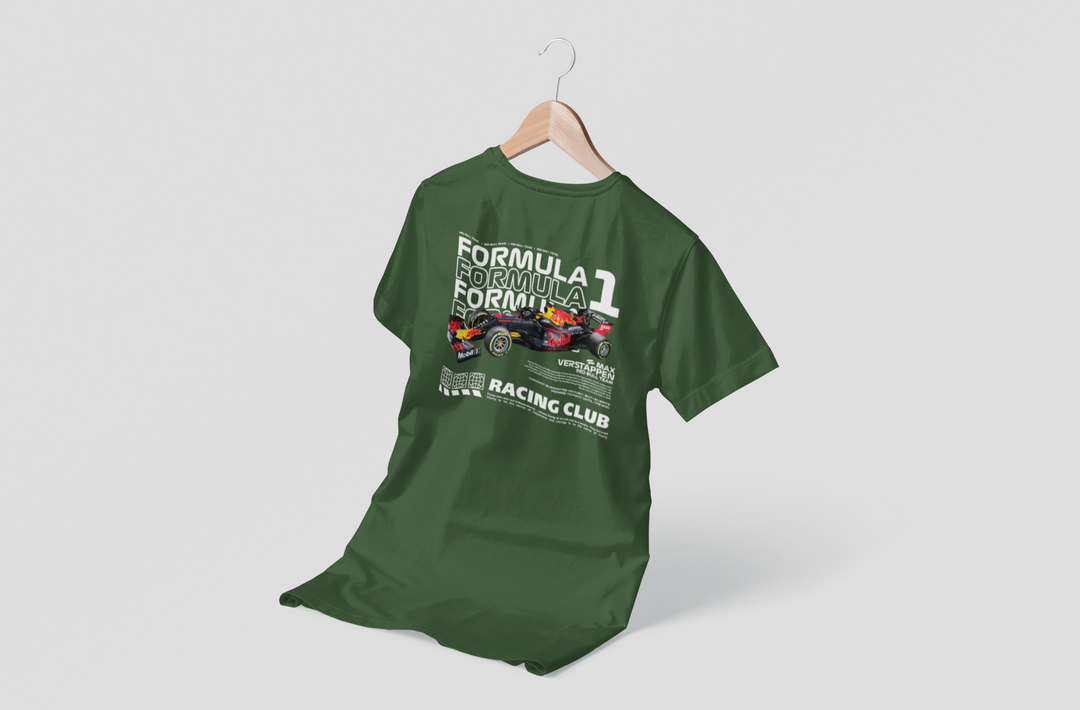 Green t-shirt with Formula 1 graphics on a hanger against a light gray background