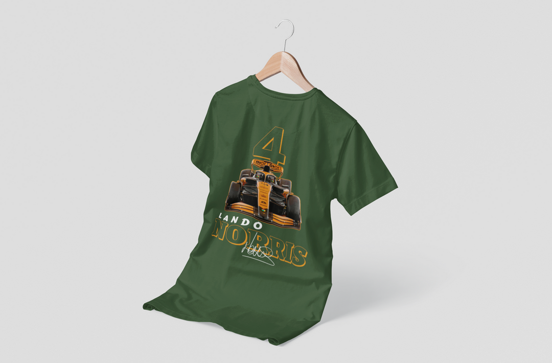 Green t-shirt with a Formula 1 car design on a hanger against a white background