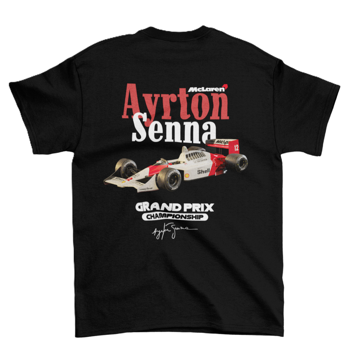 Black t-shirt with Ayrton Senna McLaren Formula 1 car graphic on a white background