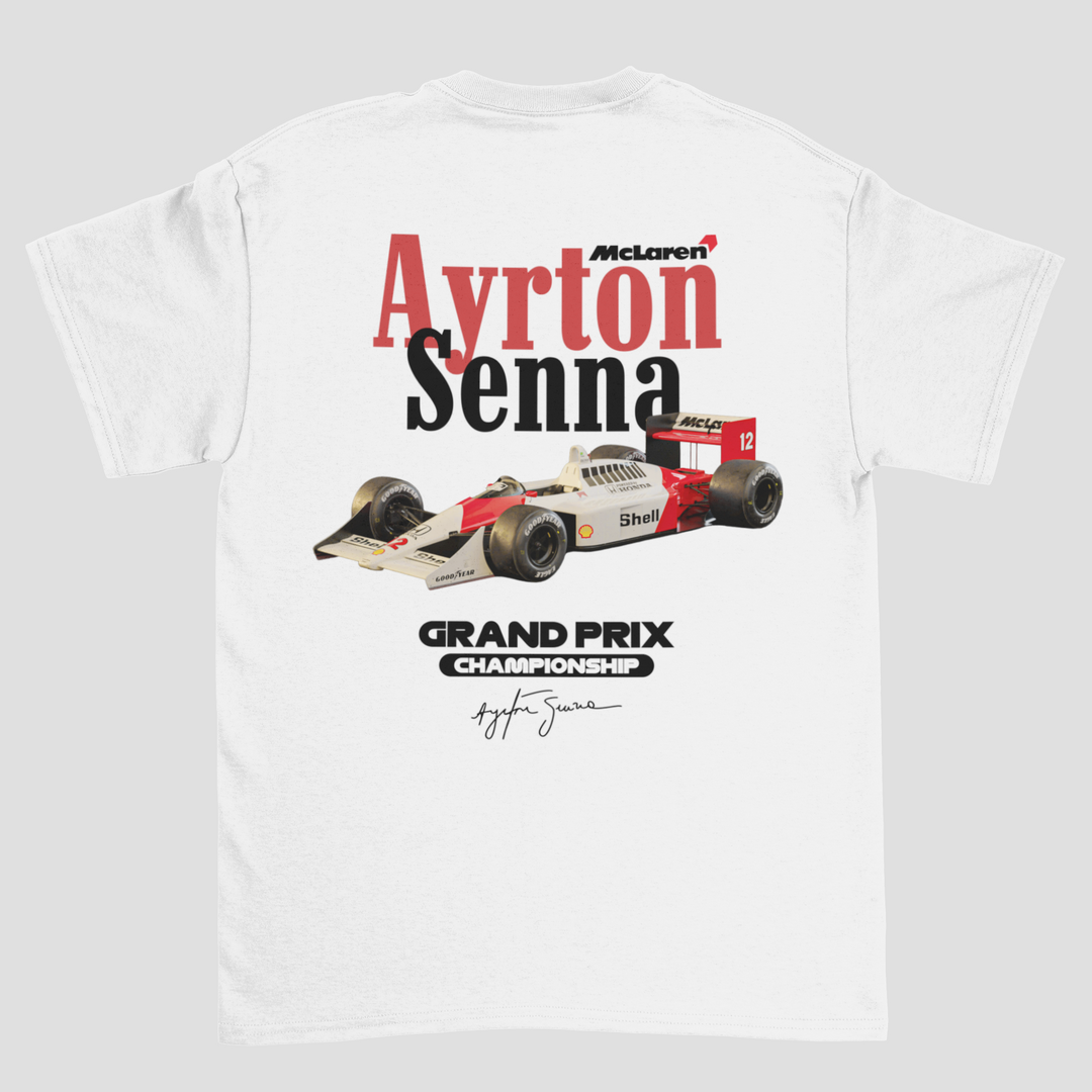 White t-shirt with Ayrton Senna McLaren Grand Prix design on a gray background