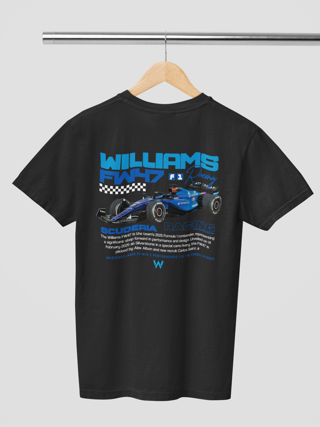 Black t-shirt with Williams F1 graphic on a hanger against a gray background