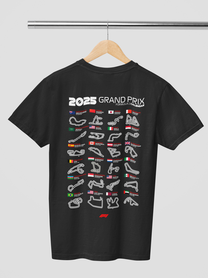 Black t-shirt with 2025 Grand Prix graphic on a hanger against a gray background