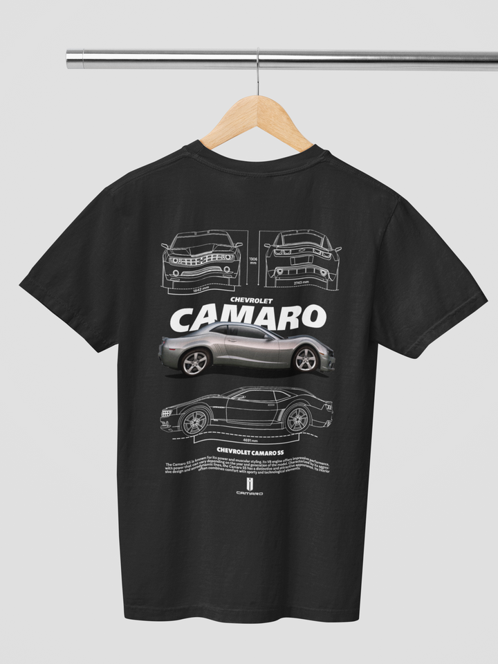 Black t-shirt with white Chevrolet Camaro graphics on a hanger against a light gray background