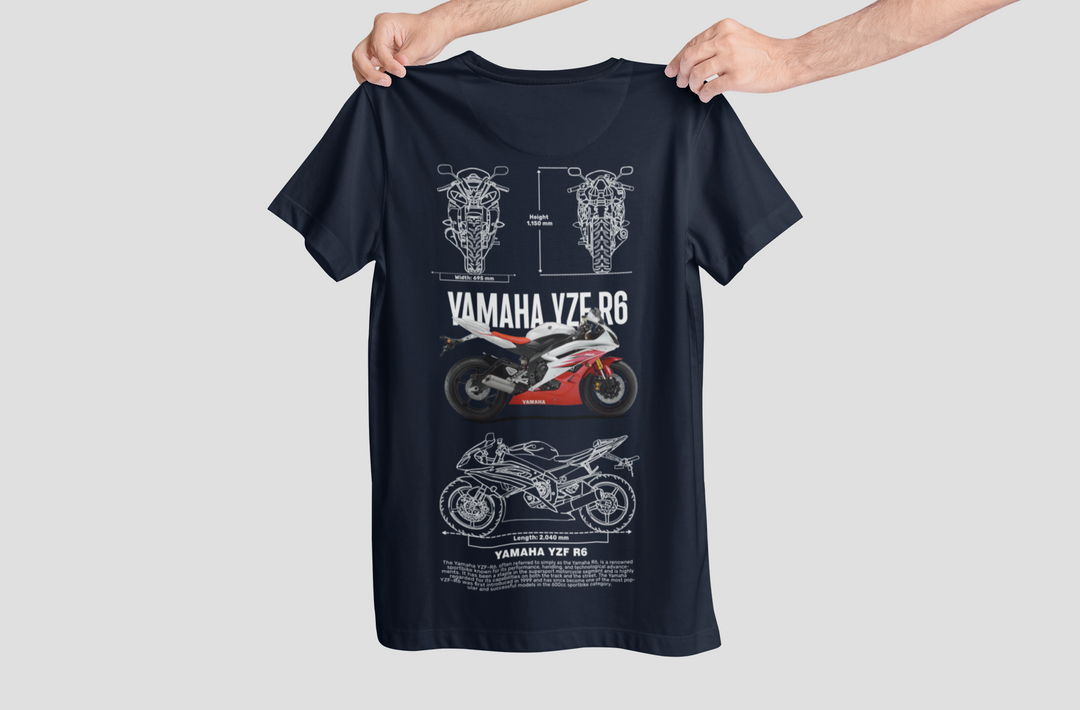 Black t-shirt with AMG GT car design held by a person on a light gray background