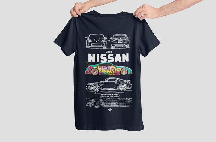 Black t-shirt with Nissan car graphics held by a person on a light gray background