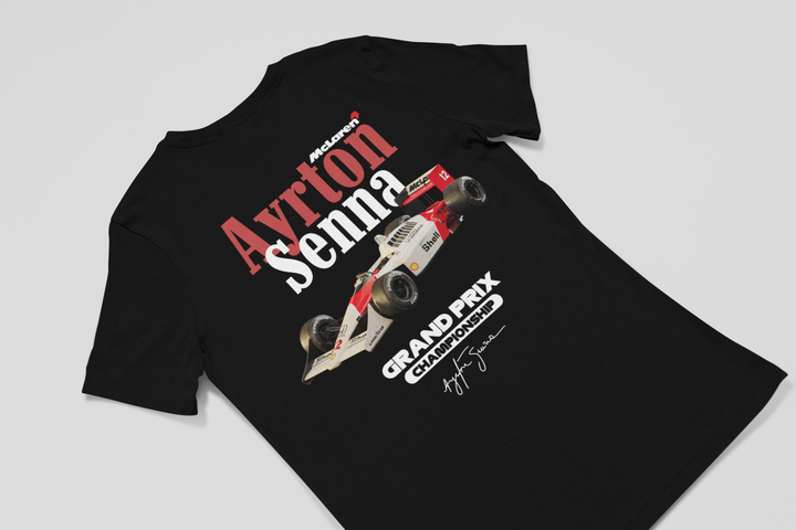 Black t-shirt with Ayrton Senna graphic design on a light gray background